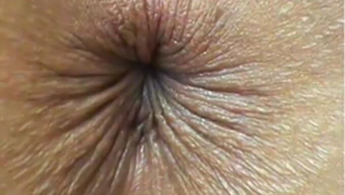 Intimate view of a pinko ass twitching on webcam