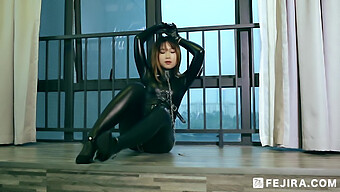 Enjoy A Latex-Clad Female Domination Encounter With A Captive Asian Girl