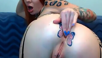 Inked Redhead Reveals Her Tattooed Backside On Webcam