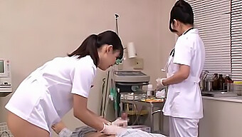 Japanese Nurses Treat Patients In A Hospital Setting