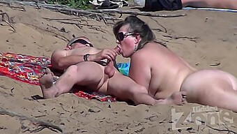 Hidden Camera Captures A Steamy Oral Sex Session On A Nudist Beach